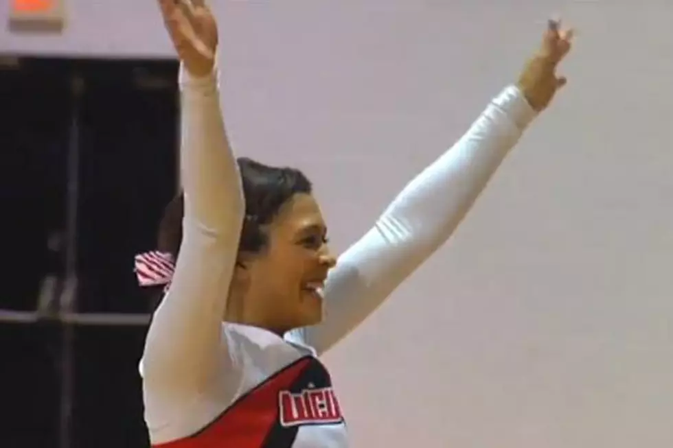 Cheerleader Makes Unbelievable Half Court Shot