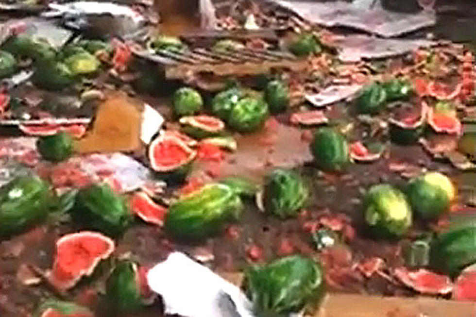 Watch a Train Completely Destroy a Truckful of Watermelons