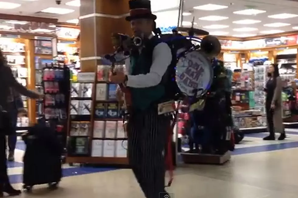 Delightful One-Man Band in Airport Nails 'Jingle Bell Rock'