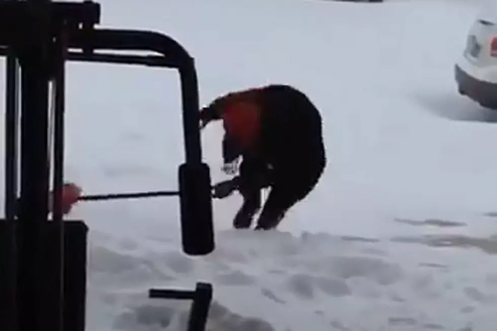 Man Shoveling Snow Goes on Slip-Sliding Spree