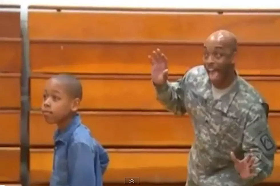 Returning Soldier Reveals He’s Home in Best Photobomb Ever