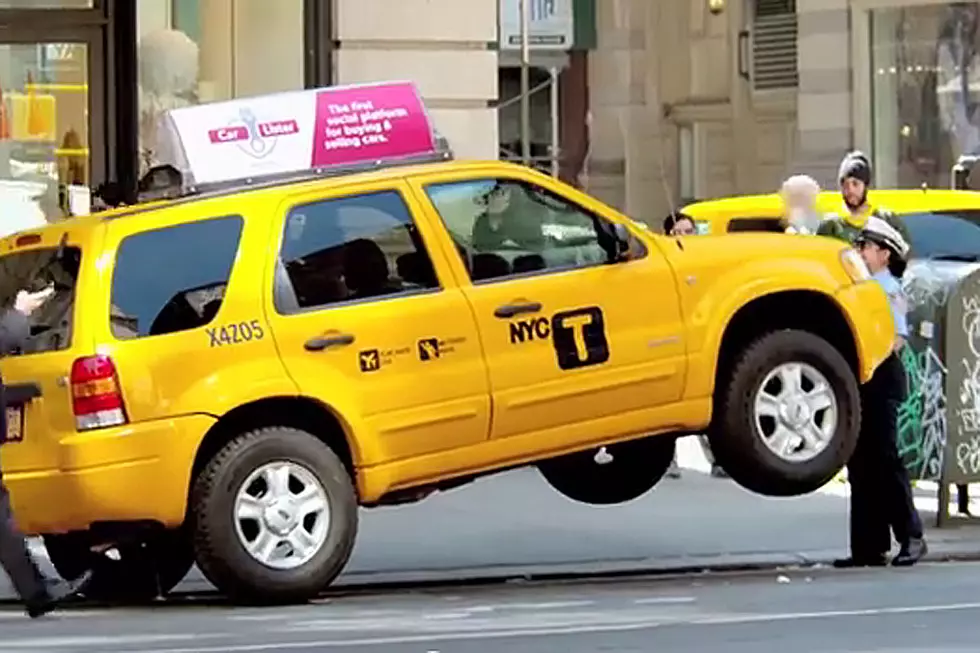 New York City Meter Maid Lifts Taxi Off the Ground — Well, Sort Of