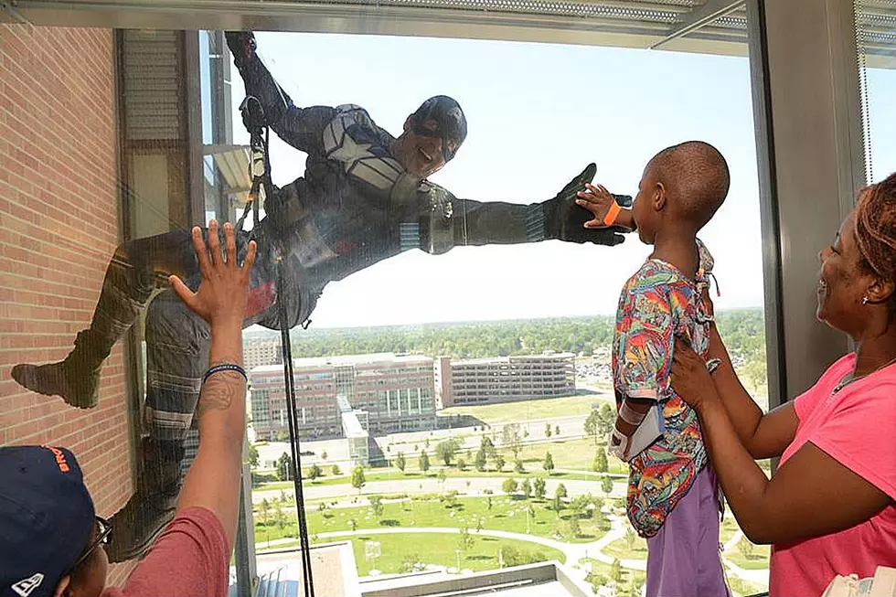 Cops Dressed As Superheroes Give Sick Kids a Thrill [PHOTOS]