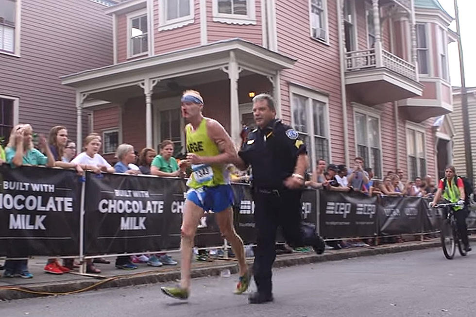 Officer Helps Bloodied, Hurt Runner to Marathon Finish Line