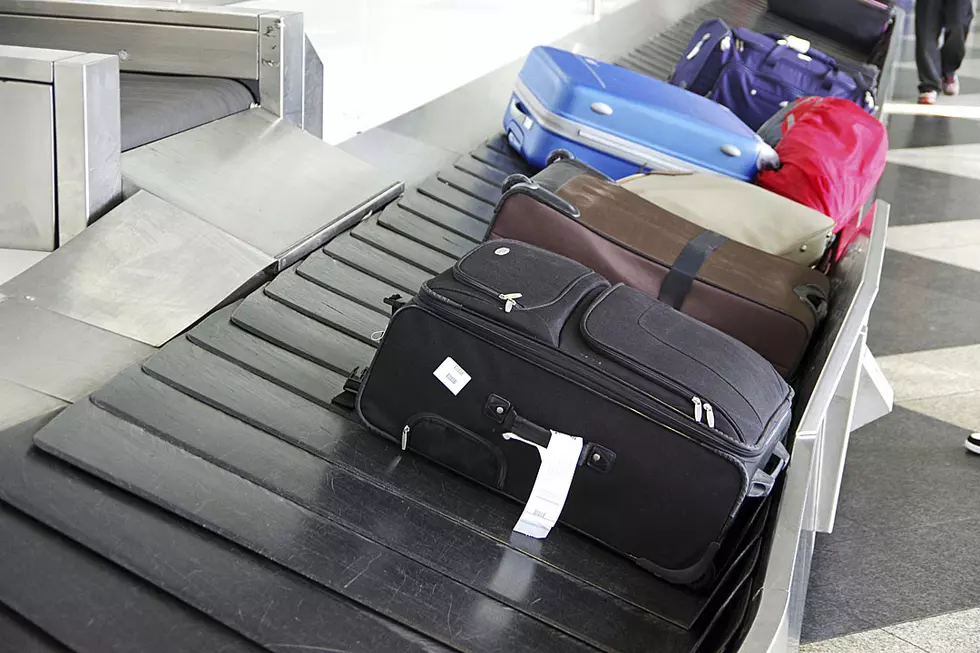 Two Year Old Takes A Wild Ride Down Airport Conveyor Belt