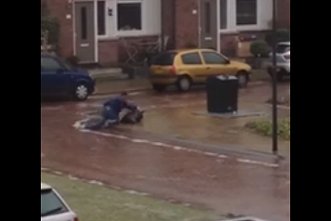 Watch Man’s Epic Slip-Slidin’ Ice Adventure Taking Out Garbage