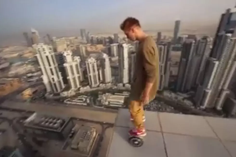 Hoverboarding Madman on Edge of Skyscraper Will Renew Your Fear of Heights