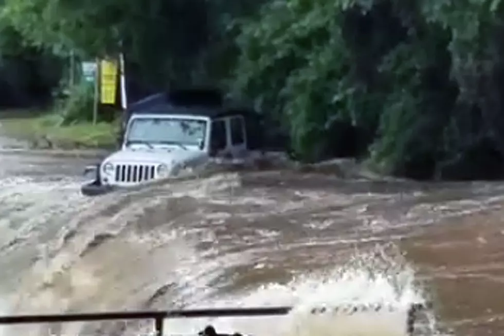 Nasty Flooding Easily Sweeps Jeep Away Along Raging River