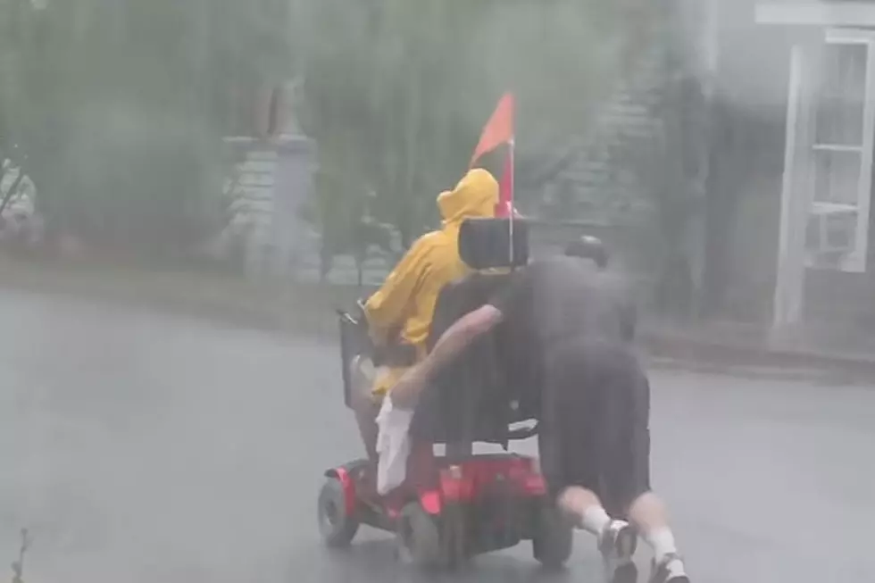 Selfless Hero Pushes Man in Wheelchair in Nasty Rainstorm