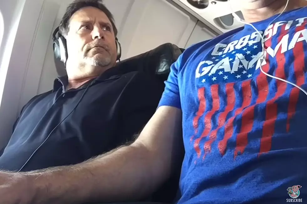 Aggravated Airplane Passenger Gets Aggressive to Win His Armrest