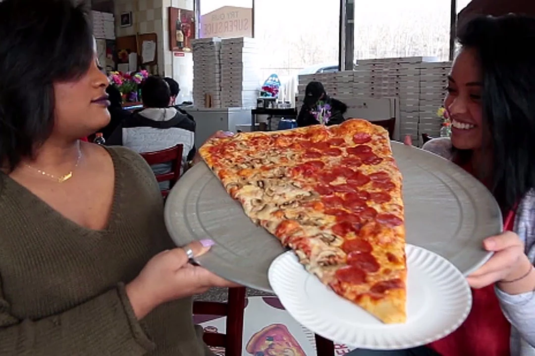 Enormous 2 Foot Long Pizza Slice Redefines Filling