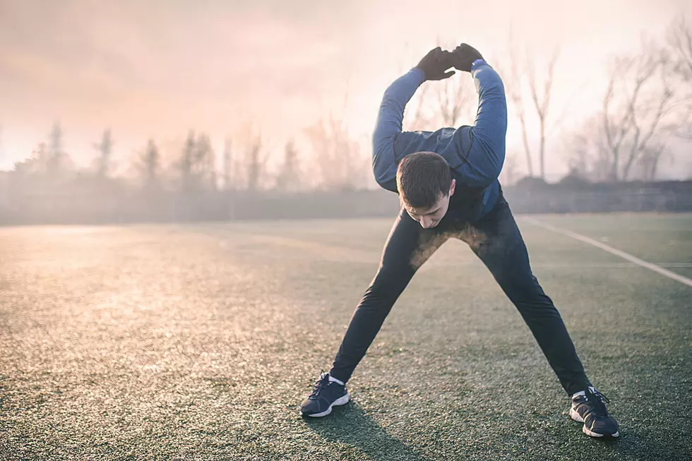 Healthy Robber Stretches Before Holding Up Over Dunkin' Donuts