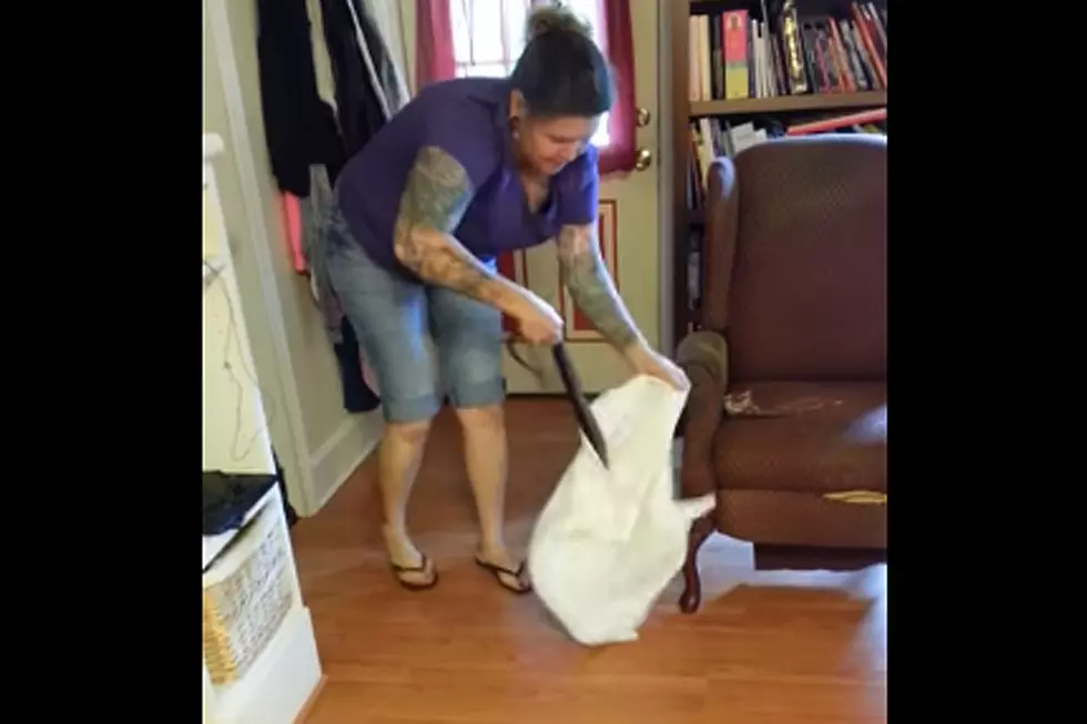 Brave (Or Crazy) Woman Catches 5-Foot Snake in Her Home