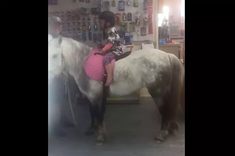 Just a Little Girl Riding Her Pony Into a Convenience Store to Do Some Shopping
