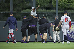 Clueless Fans Tackle Atlanta Braves Player On Field In Middle...