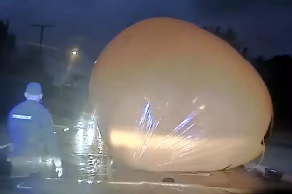 Police officer with inflatable pumpkin