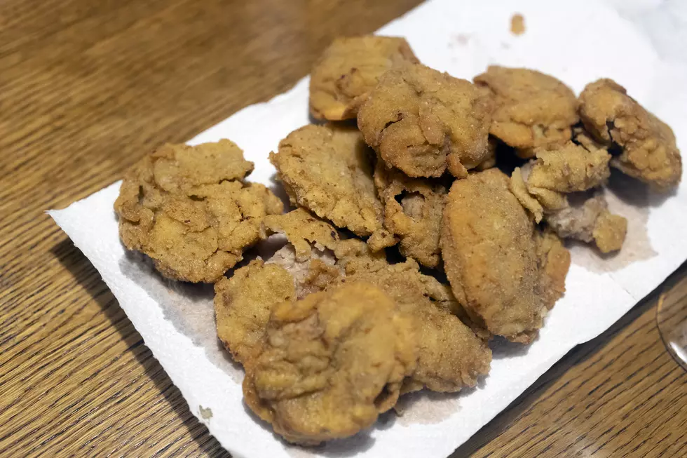 Fried Bulls Testicles on a Table - Rocky Mountain Oysters Special plate
