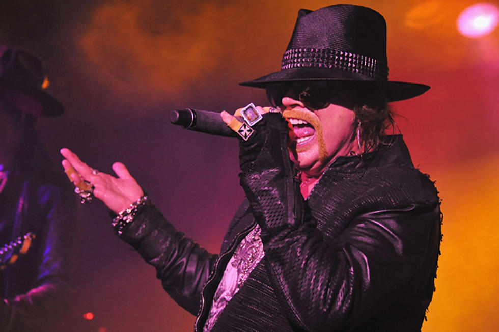 Guns N’ Roses Singer Axl Rose Dodges Beer, Suffers Fall At Liverpool Show [Video]