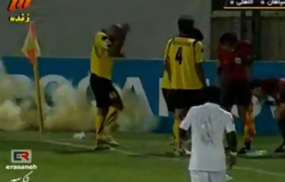 Footballer Tosses Explosive Device Off The Pitch [Video]