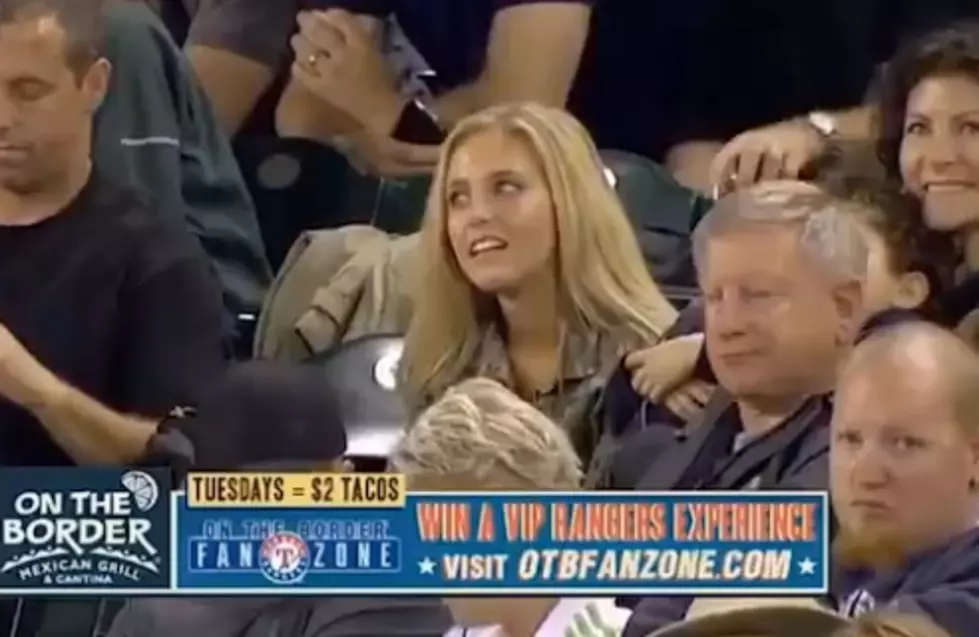 Woman In Crowd At Baseball Game Gets Creeped Out By A Guy Taking Her Picture [Video]