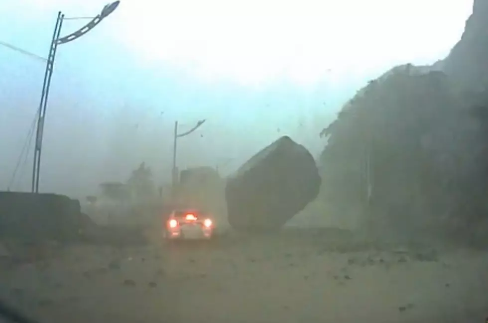 Giant Boulder Almost Crushes This Car In Taiwan [Video]