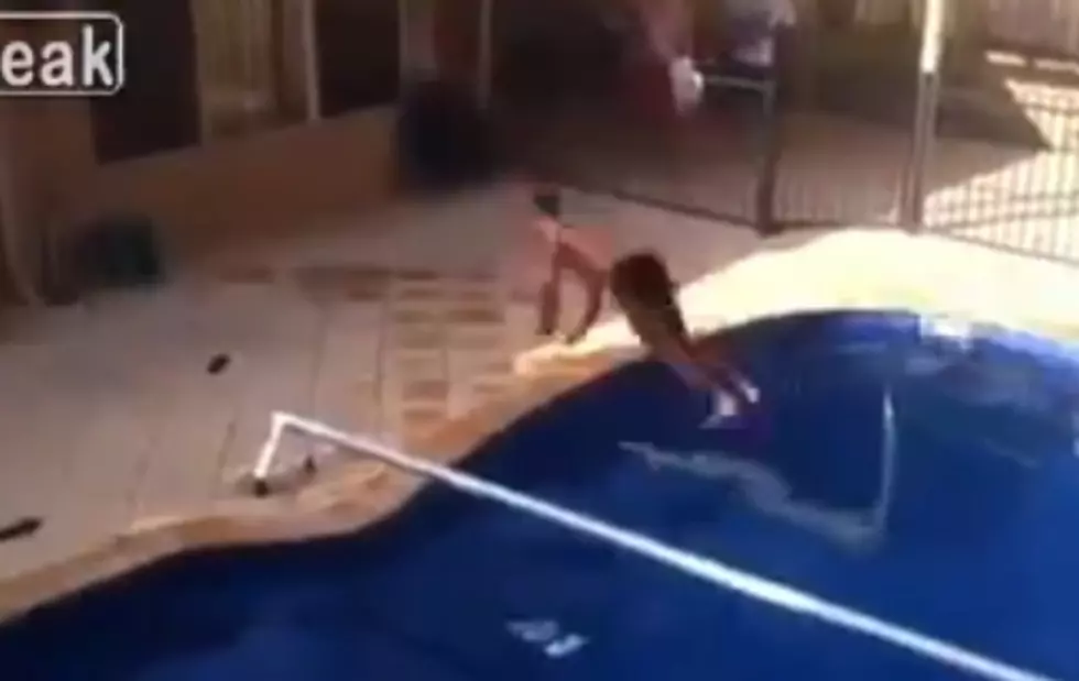 Crazy Guy Attempts Backflip Into Swimming Pool Off Of Roof [NSFW-Video]