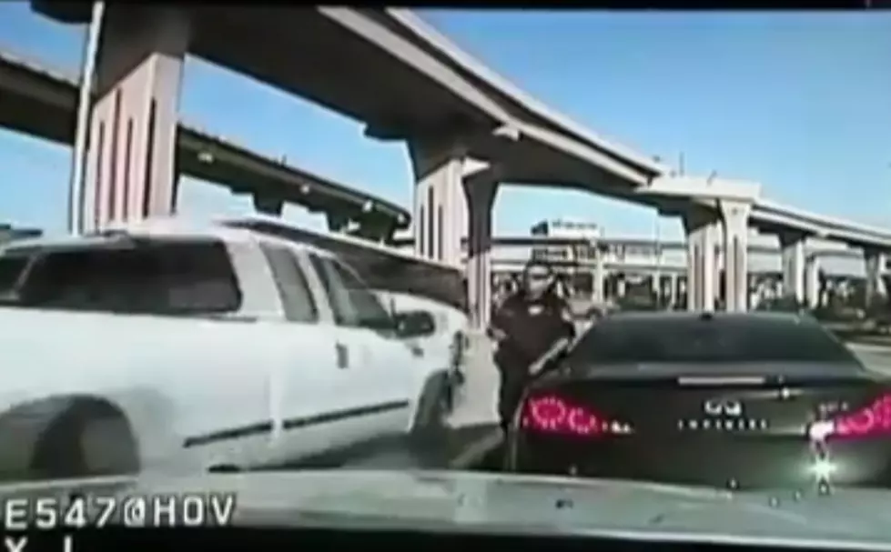Dallas Police Officer Is Nearly Killed By Speeding Car During Traffic Stop [Video]