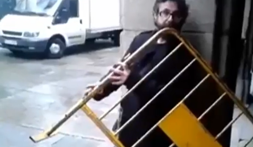 Guy Plays Metal Barricade Like A Musical Instrument [Video]