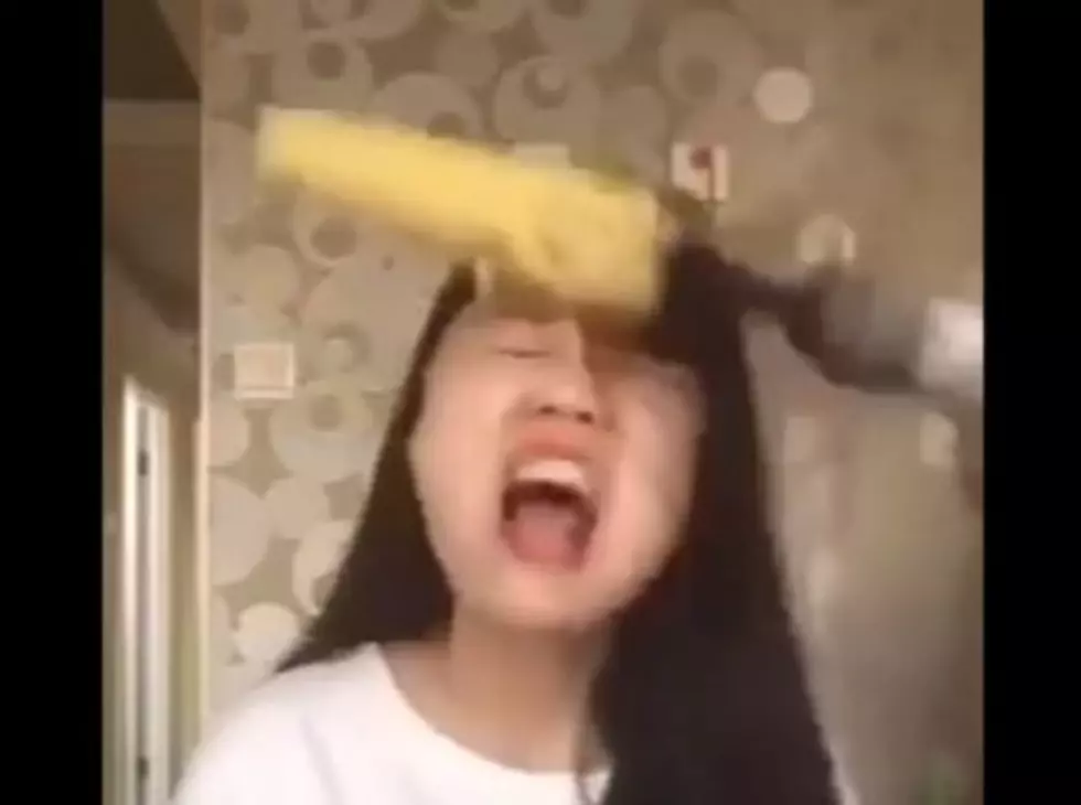 Girl Rips Out Hair Trying To Eat Corn Off Of Drill [Watch]