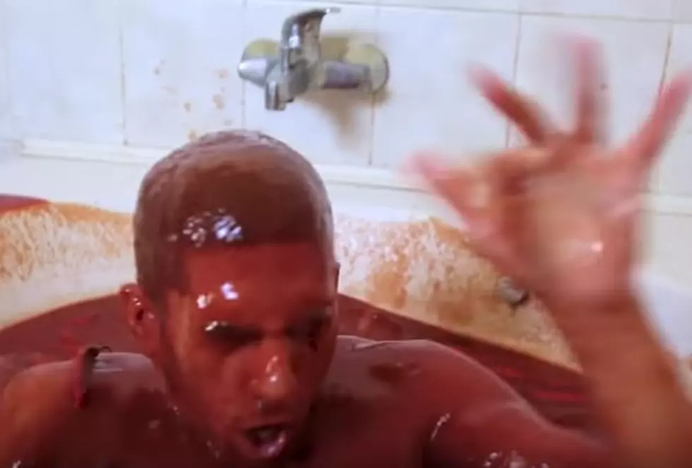 Dude Bathes In 1250 Bottles Of Hot Sauce [Video]