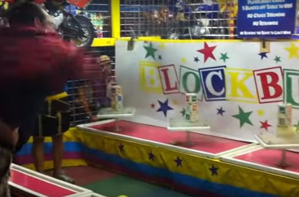 Guy’s Last Shot At Winning This Carnival Game Is Glorious [Watch]