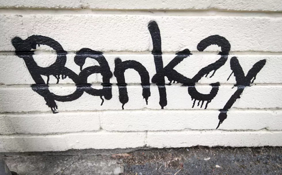 Is This Banksy? Woman Claims To Have Caught Artist On Video [WATCH]