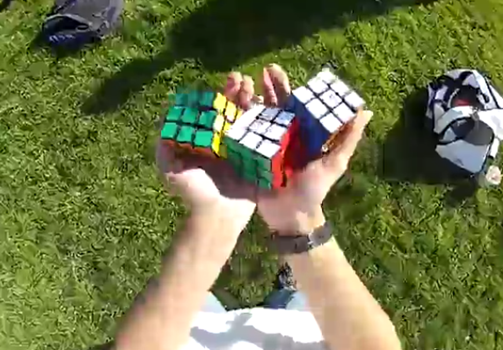 Solving Three Rubik’s Cubes While Juggling Them [Video]