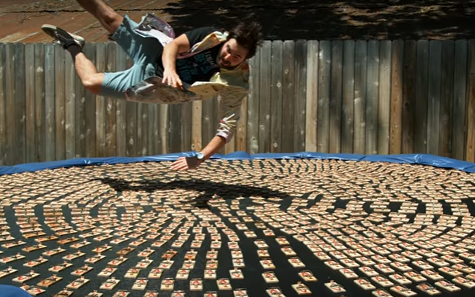 Slow Mo Jumping On Trampoline With 1,000 Mouse Traps [Video]