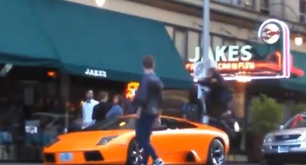Kid Pulls A BMX Move On Top Of A Real Expensive Lamborghini [VIDEO]