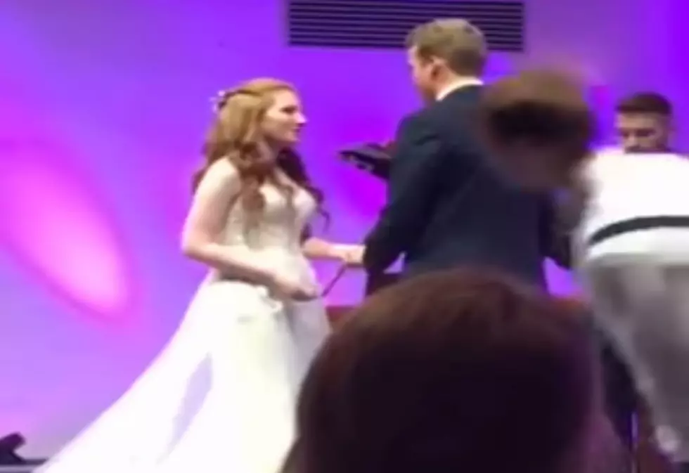 Groomsman Falls Flat On His Face At Wedding Ceremony [Video]