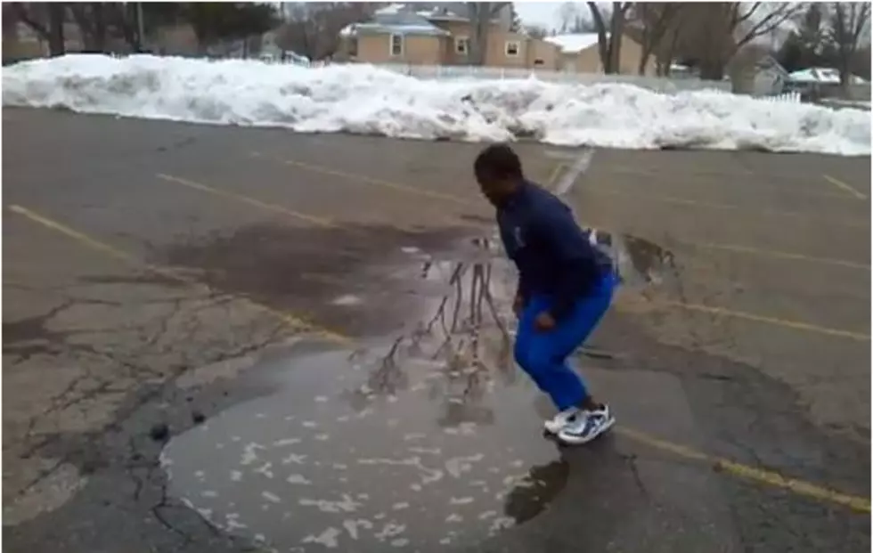 Man Jumps Into Seemingly Shallow Puddle - Gets Huge Surprise [Video]