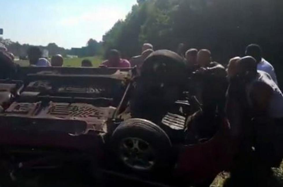 Drivers Abandon Their Cars, Rescue Man From Flipped Convertible [VIDEO]