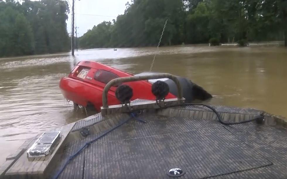Heroes At Work In Flood Waters Save Woman, Dog [VIDEO]