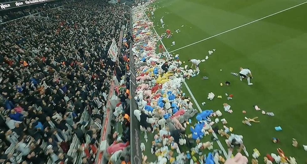 Soccer Fans in Turkey Cover Field in Toys for Earthquake Victims