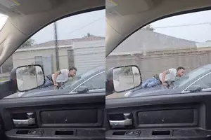 Viral Video Shows Man Clinging to the Hood of a Moving Car in...