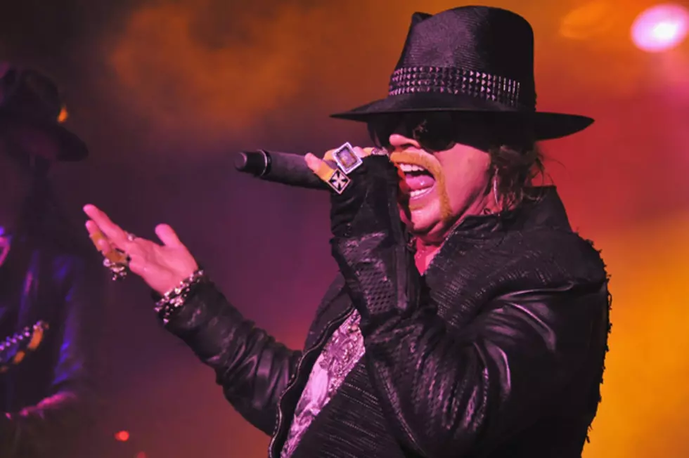 Guns N&#8217; Roses Singer Axl Rose Dodges Beer, Suffers Fall at Liverpool Show