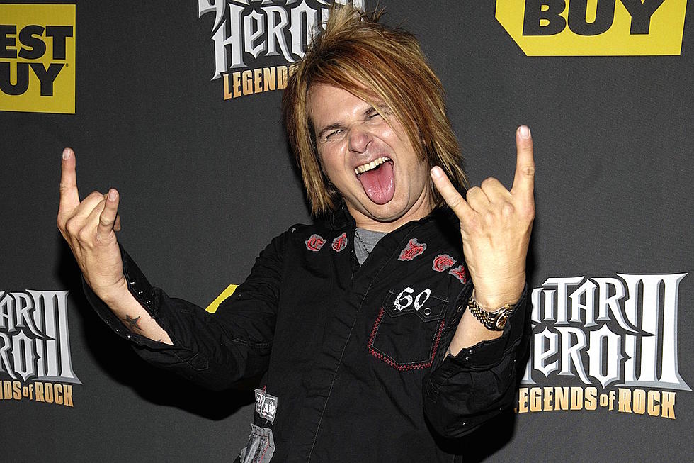 Poison Drummer Rikki Rockett Remains Cancer Free One Year After Experimental Therapy