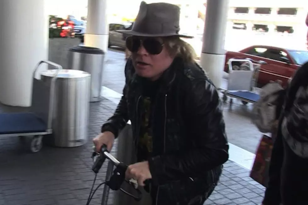 Guns N’ Roses’ Axl Rose Talks AC/DC, Prince + Coachella During Paparazzi Encounter at Los Angeles Airport