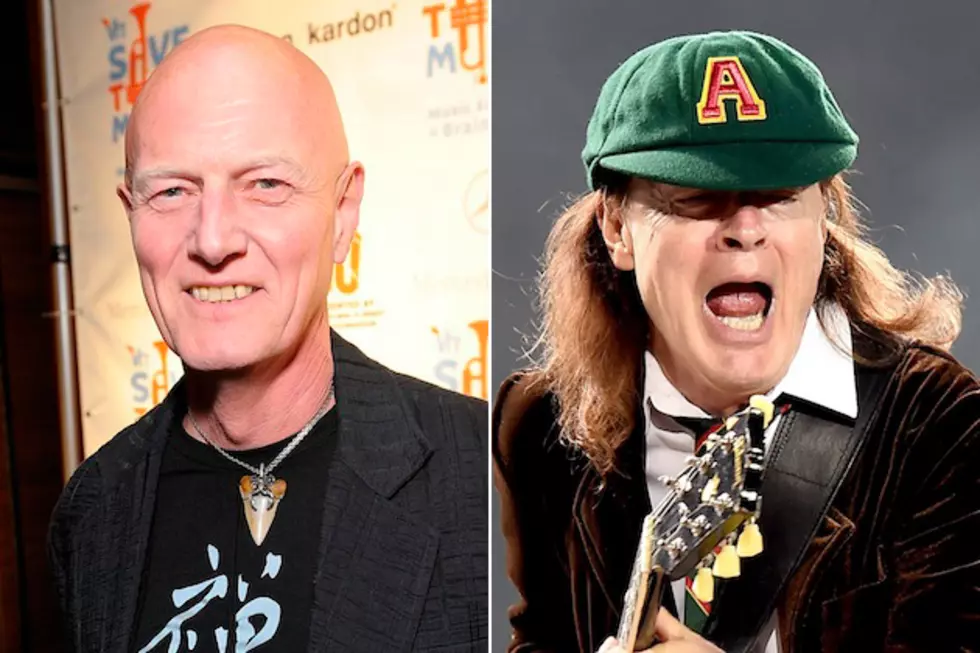Chris Slade: Angus Young &#8216;Definitely Not Thinking of Retiring&#8217; AC/DC