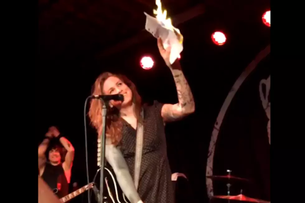 Against Me! Frontwoman Laura Jane Grace Burns Birth Certificate at North Carolina Show