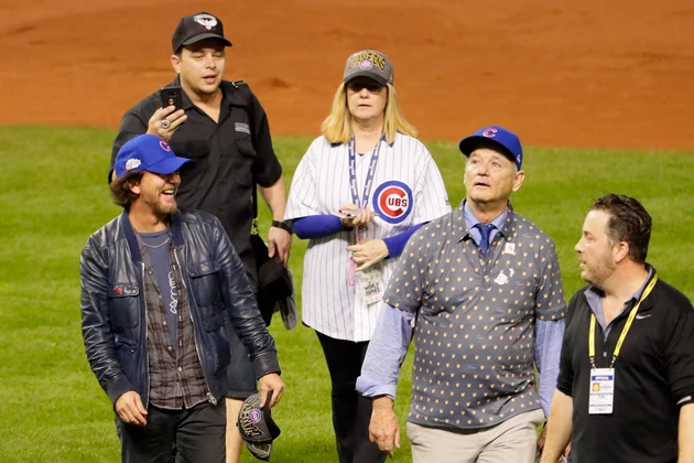 Chicago Cubs on X: Eddie Vedder signs a fan's #Cubs jersey before  tonight's game.  / X
