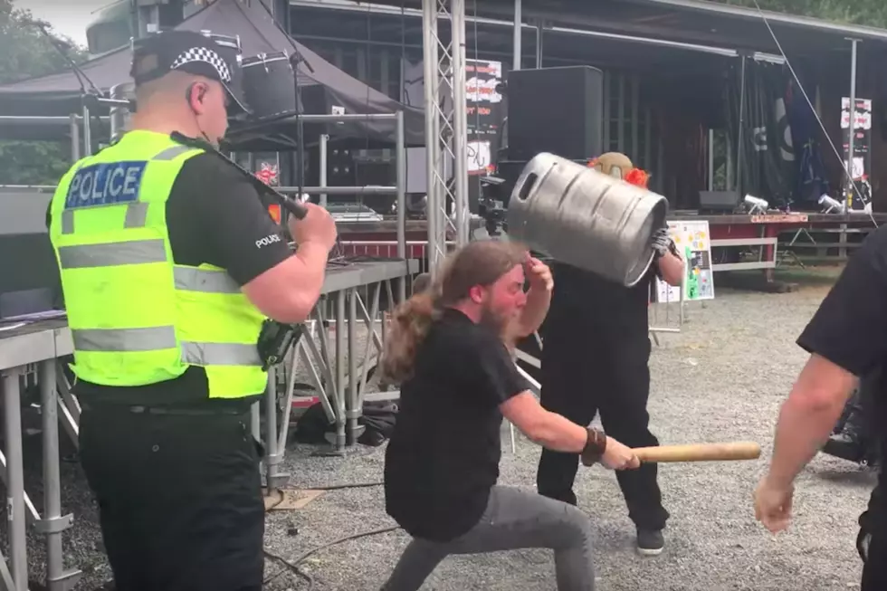 Fan Knocks Himself Out While He and Police Officer Pound Slipknot Cover Band’s Keg