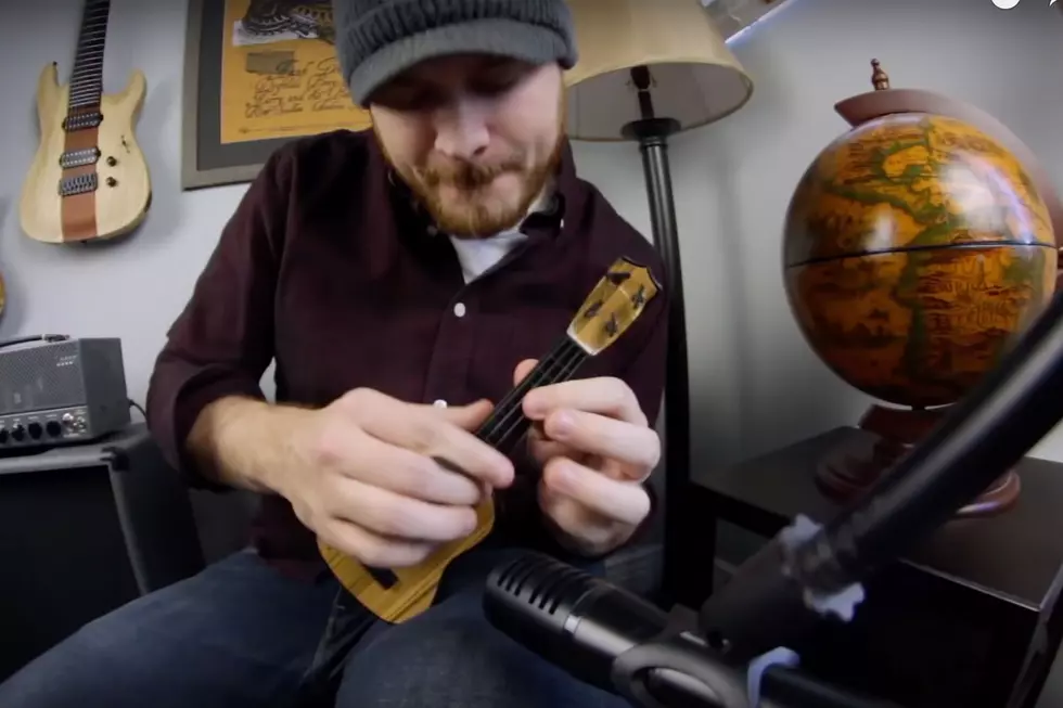 Watch Rob Scallon Rock Out on a $1 Guitar