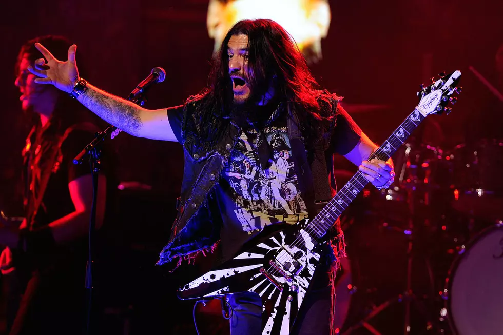 Watch Couple Get Engaged in the Pit at Machine Head Show